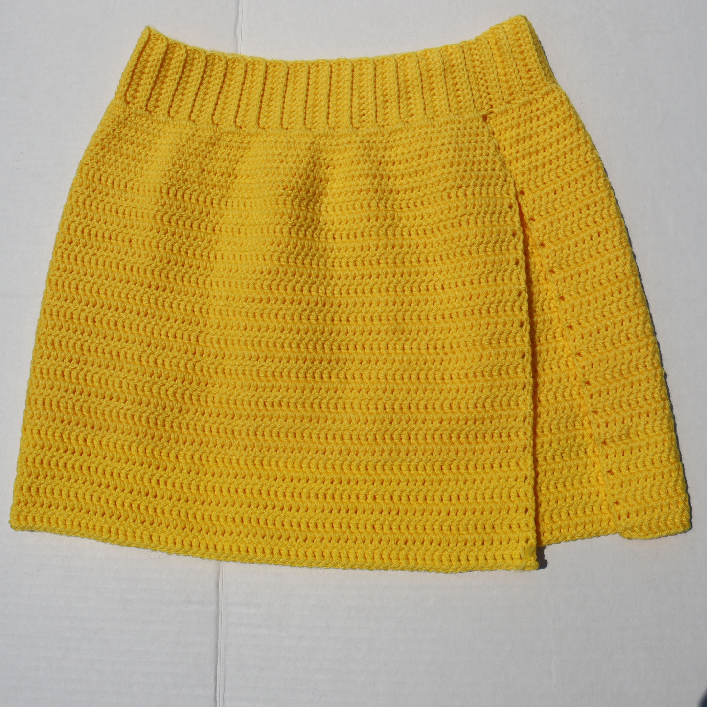 yellow crochet mini skirt with side slit